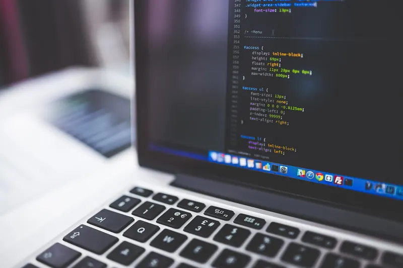 Laptop showing source code